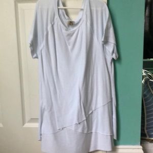 A soft see through white shirt with layers